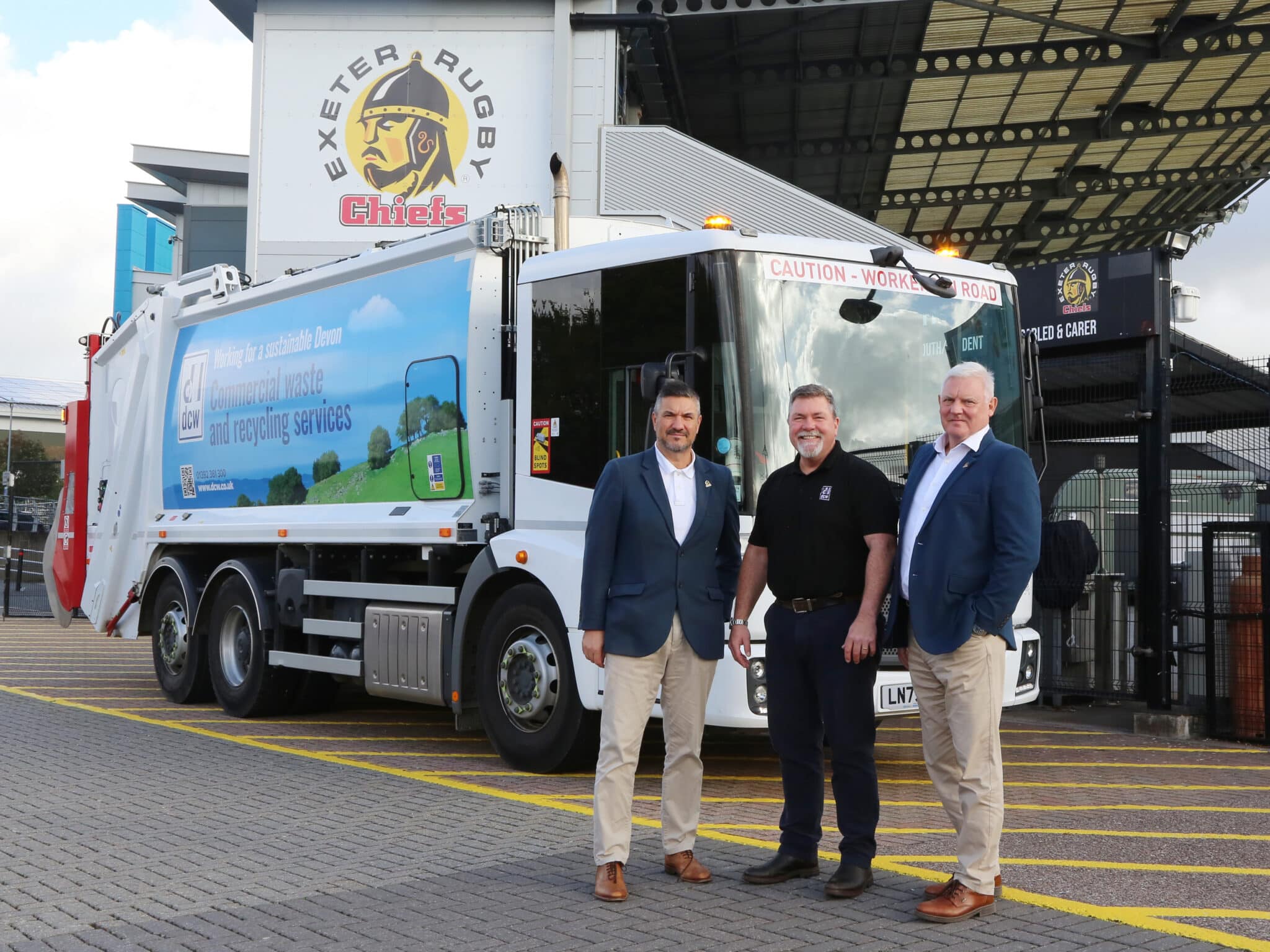 Mark Isaacs, Stadiums Operator at Exeter Chiefs, Grant Scott, General Manager at DCW and Colin Woods, Head of Corporate Sales at Exeter Chiefs, celebrating the seventh year of the partnership.